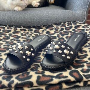 Marc Fisher black w/big studs on front.  Super cute sandal. Size 8 1/2. Like new